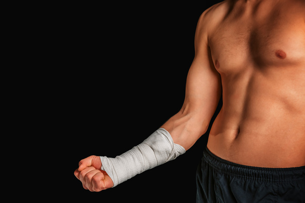 Sportsman with bandaged arm - Φωτογραφία, εικόνα