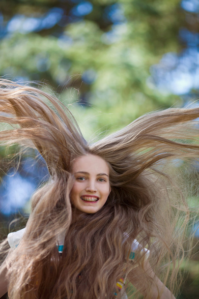 Girl with long hair - Фото, изображение