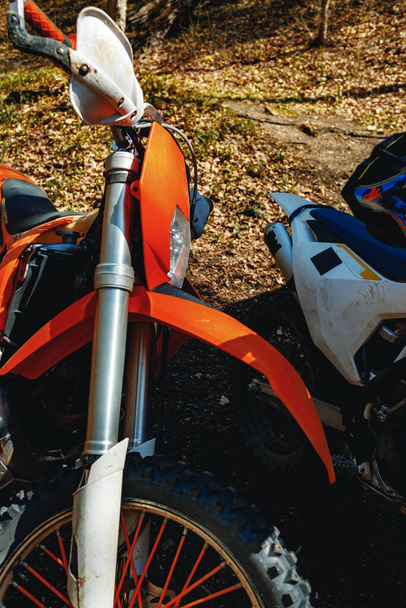 Close-up details of cross motorcycle parked on ground - Valokuva, kuva