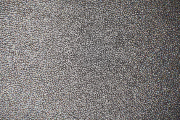 Textured surface of dark gray leatherette, leather, or dermantine. - Fotoğraf, Görsel
