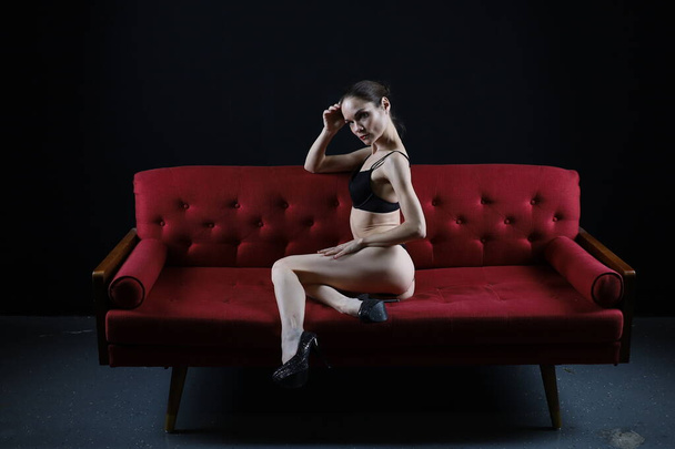 Photoshoot of a ballerina posing in a studio - Zdjęcie, obraz