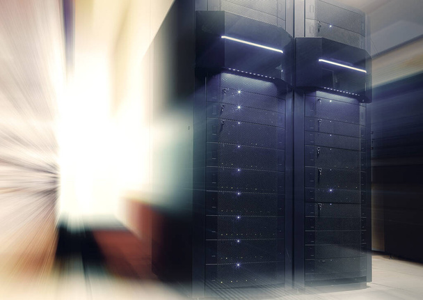 futuristic modern server room in the data center with light blur and motion - Foto, Imagen