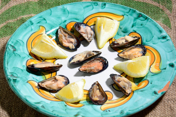 mussels and lemon original italian sea food, they can also be eaten raw - Photo, Image