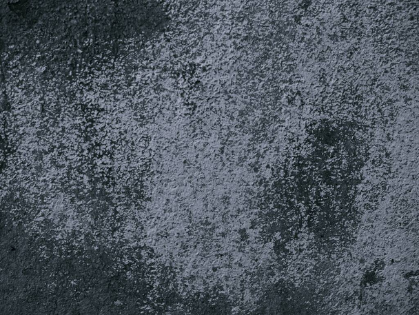 Imagem de fundo preto e branco, superfície áspera, parece um piso de cimento. - Foto, Imagem
