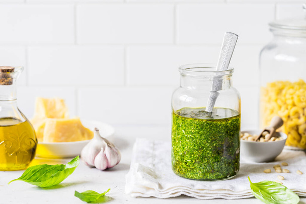 Pesto Sauce with  Ingredients: Fresh Basil, Pine Nuts, Olive Oil and Cheese, copy space for your text - Fotoğraf, Görsel