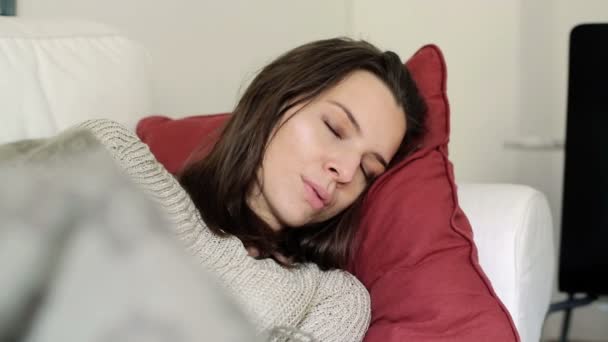Woman sleeping on sofa - Felvétel, videó