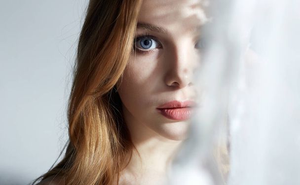 Lovely beautiful young Woman. Sweet Girl in daylight from a window. beautiful female lovely Face - Photo, Image