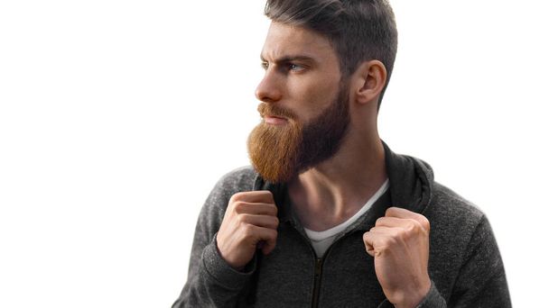 Portrait brutal bearded hipster man isolated on white background. Copy space on left - Foto, Imagen