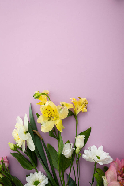 Flowers bouquet on pink surface - Foto, Imagem