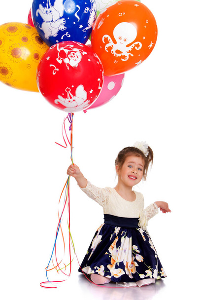 Lovely girl with colorful balloons - Valokuva, kuva
