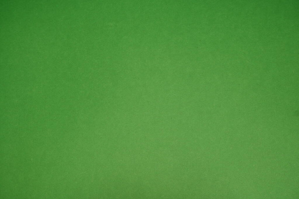 Green background. The texture of the cardboard - 写真・画像
