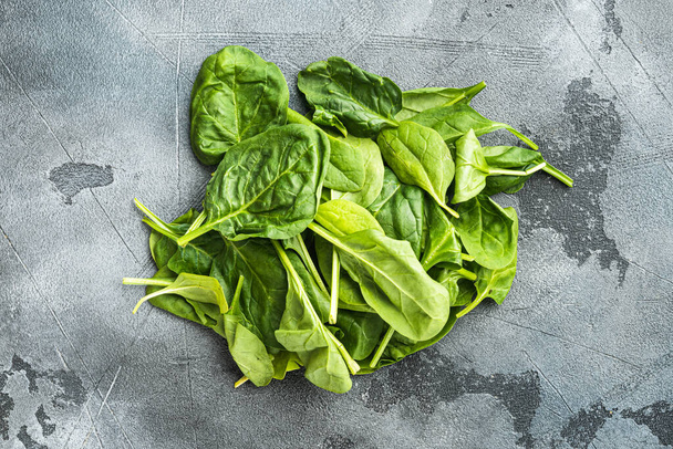 Fresh spinach set, on gray stone background, top view flat lay - Photo, Image