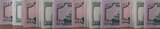 Primo piano banconote da 50 dollari e 100 dollari. Tintura stile vintage - Foto, immagini