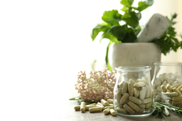Concept of herbal medicine pills, space for text - Foto, imagen