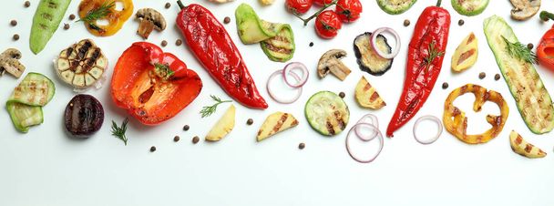 Tasty grilled vegetables on white background, top view - Foto, Imagem