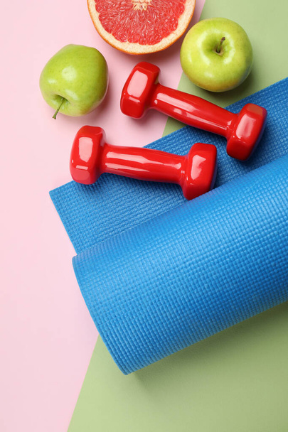 Healthy lifestyle accessories on two tone background - Fotoğraf, Görsel