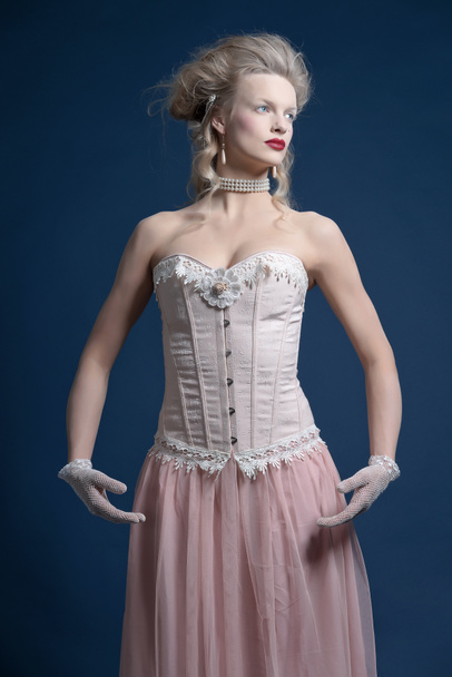 Retro classic baroque ballet fashion woman wearing pink corset a - Fotó, kép