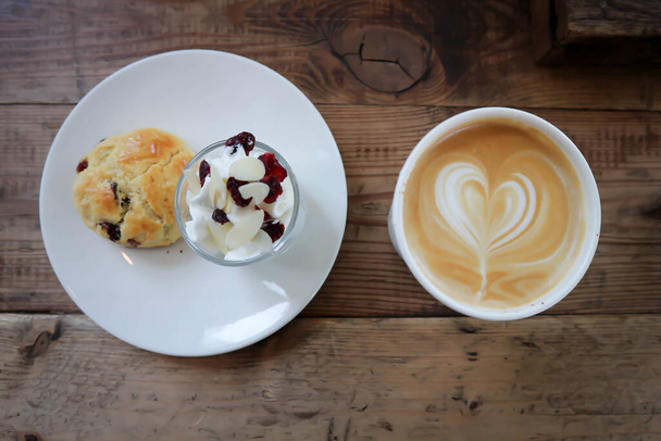 hot cofffee, cappuccino coffee and scone , scone with whipped cream for serve - Fotografie, Obrázek