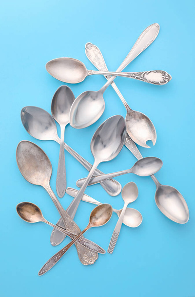 Clean spoons on color background - Photo, Image