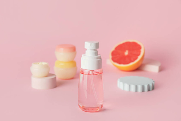Bottle of natural cosmetics on color background - Photo, Image
