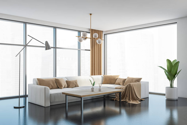 White relaxing room interior with corner sofa with pillows and wooden coffee table, lamp and plant, side view. Panoramic window with Singapore city view. 3D rendering - Foto, imagen