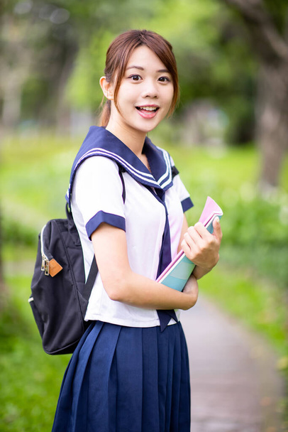 Asian high school student smile at you on campus - Photo, Image