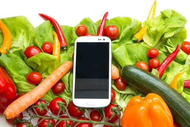 Vegetables and a Smartphone			 - Фото, изображение
