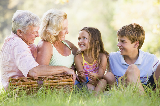 Grandparents having a picnic with grandchildren - Φωτογραφία, εικόνα