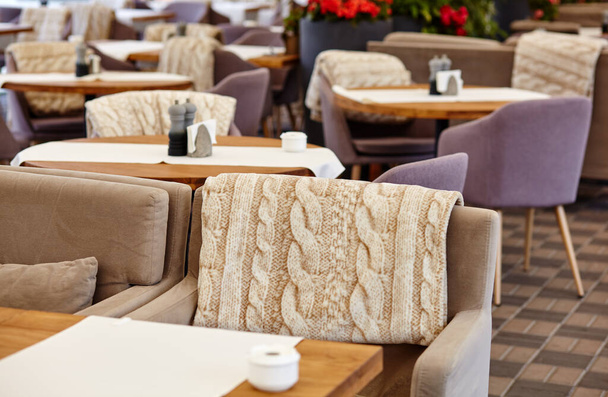 Restaurant or cafe with cozy interior. View of modern dinning room interior - Zdjęcie, obraz