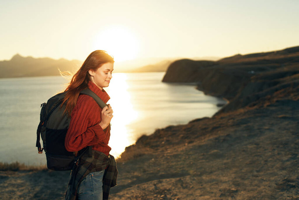 Woman tourist backpack travel nature landscape adventure - Фото, зображення