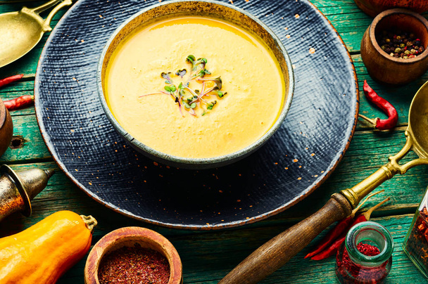 Vegetarian pumpkin cream soup.Bowl of autumn vegan pumpkin soup. - Photo, Image