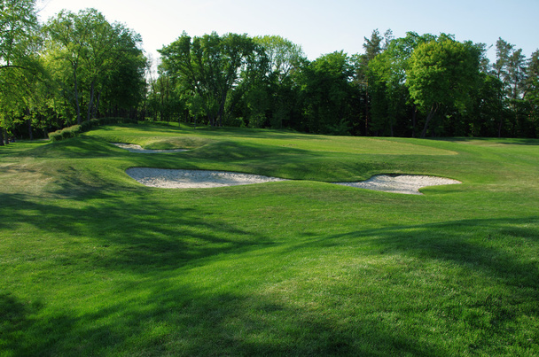 Sand bunkers on the golf course.  - Photo, Image