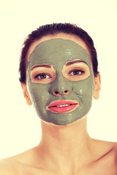Beautifu toplessl woman with facial mask. - Photo, image