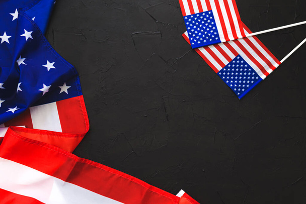 American Stars and Stripes flag on black background. National symbol for Memorial Day 4 July (Independence Day).  - Fotografie, Obrázek