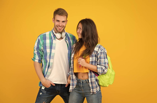 Romantic date. Couple in love yellow background. Sexy woman and handsome man in casual style. Romantic relationship. Love and romance. Feeling young and happy - Foto, Imagem