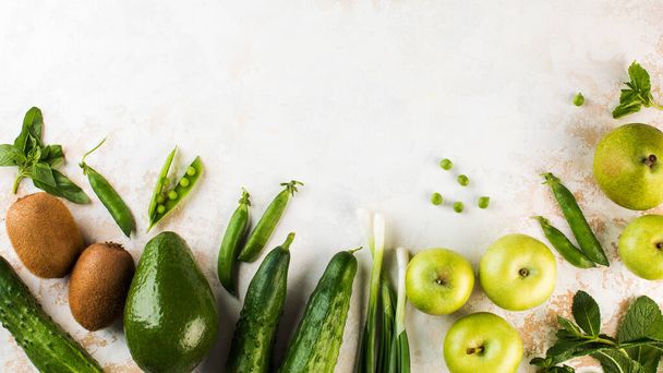 Green fresh vegetables and fruits. Vegetarianism. Copy space. - Fotografie, Obrázek