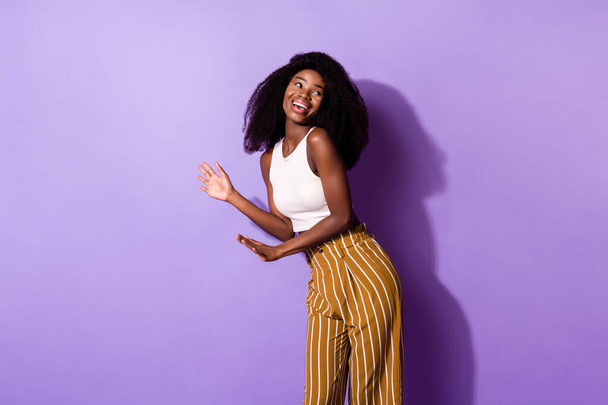Portrait of attractive cheerful girl dancing having fun good mood isolated over bright violet purple color background - Φωτογραφία, εικόνα