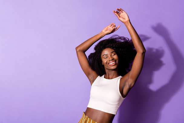 Portrait of attractive dreamy cheerful girl dancing rest relax isolated over bright violet purple color background - Φωτογραφία, εικόνα