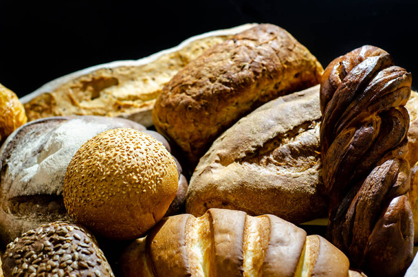 Baked goods. Butter buns, french baguette, croissant and bread. - Photo, Image