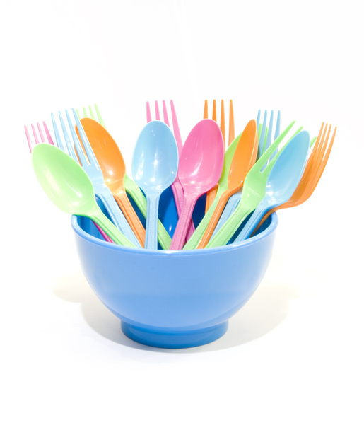 Vaisselle en plastique composée d'une cuillère, d'une fourchette et de bols
  - Photo, image