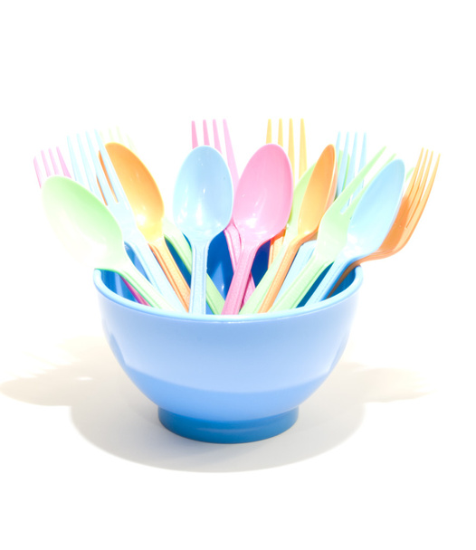 Plastic tableware consisting of spoon, fork and bowls  - Photo, Image