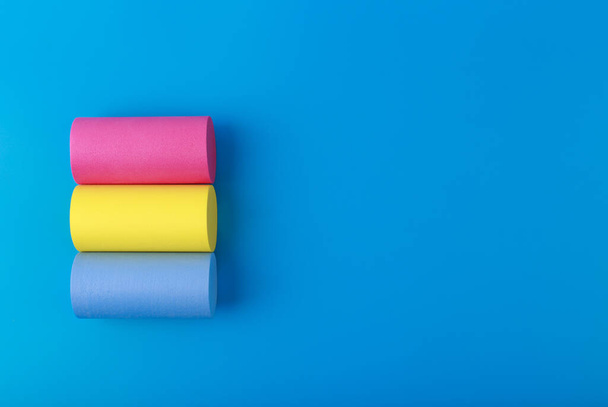 Pansexual flag on blue background with copy space Symbol of pansexual community - Valokuva, kuva