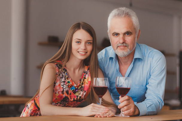 couple holding wine glasess - Photo, image