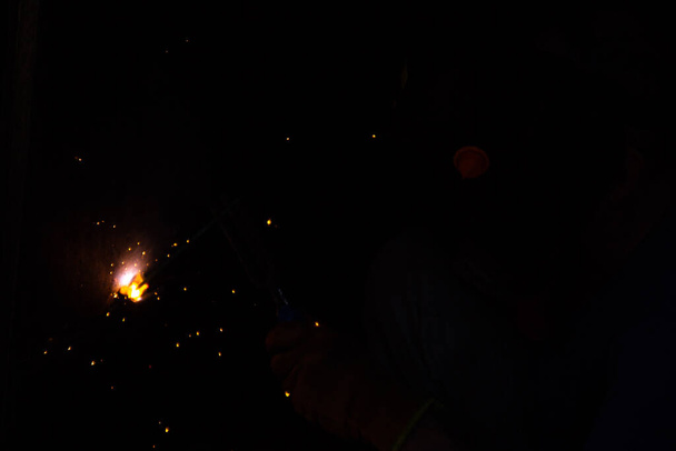 blacksmith work in the dark - Photo, Image
