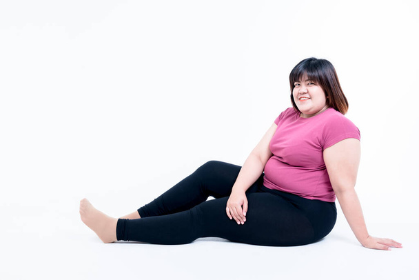 Portrait images of Asian fat woman are sitting and smiling On white background, to pretty woman and health care concept. - Photo, Image