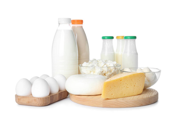Different dairy products and chicken eggs on white background - Foto, Imagem