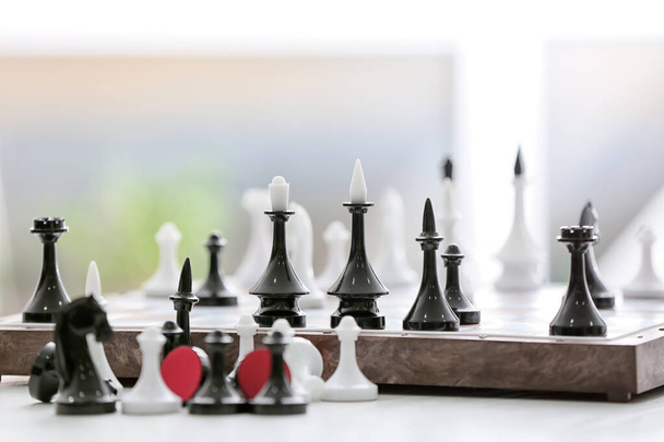 Board with chess pieces on table - Photo, Image