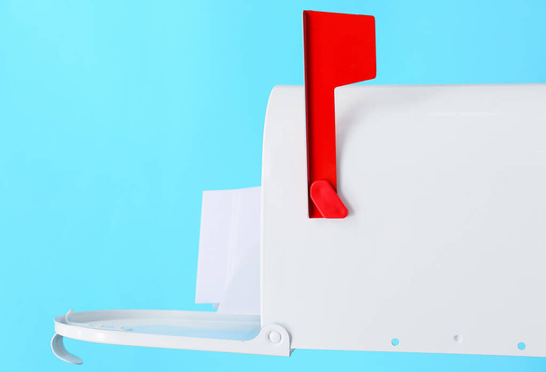 Mail box with letter on color background - Photo, image