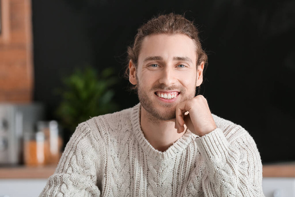 Smiling young man at home - Fotó, kép