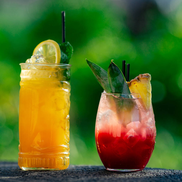 summer cocktails on green background - Photo, image